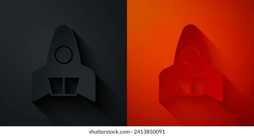 Paper cut Rocket ship icon isolated on black and red background. Space travel. Paper art style. Vector