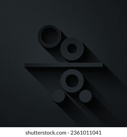 Paper cut Paper roll of a printing press icon isolated on black background. Paper art style. Vector