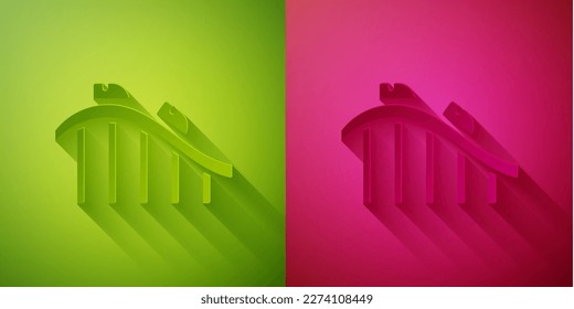 Paper cut Roller coaster icon isolated on green and pink background. Amusement park. Childrens entertainment playground, recreation park. Paper art style. Vector
