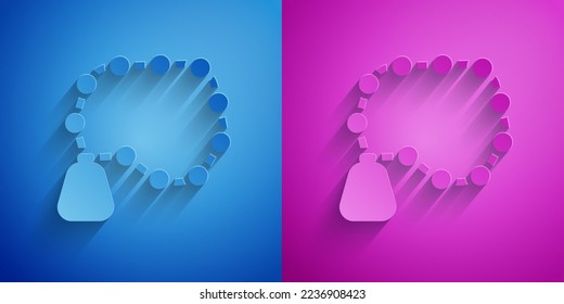 Paper cut Rosary beads religion icon isolated on blue and purple background. Paper art style. Vector