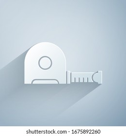 Paper cut Roulette construction icon isolated on grey background. Tape measure symbol. Paper art style. Vector Illustration