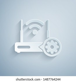 Paper cut Router and wi-fi signal and gear icon isolated on grey background. Adjusting app, service concept, setting options, maintenance, repair, fixing. Paper art style. Vector Illustration