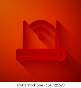 Paper cut Router and wi-fi signal symbol icon isolated on red background. Wireless ethernet modem router. Computer technology internet. Paper art style. Vector Illustration