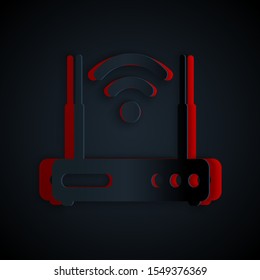 Paper cut Router and wi-fi signal symbol icon isolated on black background. Wireless ethernet modem router. Computer technology internet. Paper art style. Vector Illustration