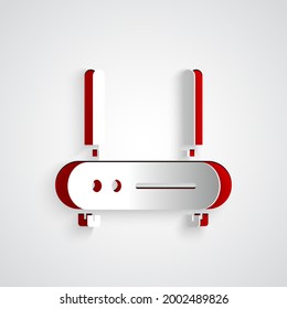 Paper cut Router and wi-fi signal icon isolated on grey background. Wireless ethernet modem router. Computer technology internet. Paper art style. Vector Illustration