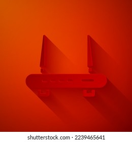 Paper cut Router and wi-fi signal icon isolated on red background. Wireless ethernet modem router. Computer technology internet. Paper art style. Vector
