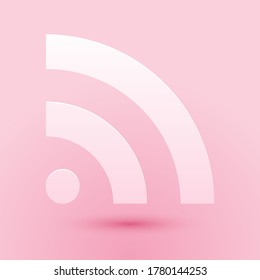 Paper cut RSS icon isolated on pink background. Radio signal. RSS feed symbol. Paper art style. Vector