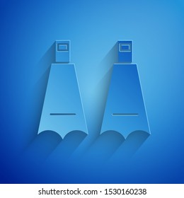 Paper cut Rubber flippers for swimming icon isolated on blue background. Diving equipment. Extreme sport. Diving underwater equipment. Paper art style. Vector Illustration