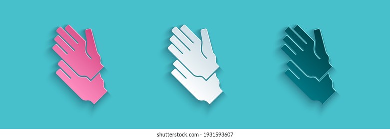 Paper cut Rubber gloves icon isolated on blue background. Latex hand protection sign. Housework cleaning equipment symbol. Paper art style. Vector