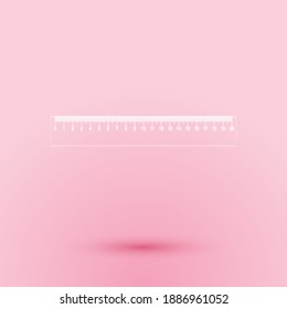 Paper cut Ruler icon isolated on pink background. Straightedge symbol. Paper art style. Vector.