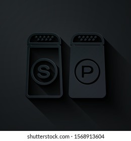 Paper cut Salt and pepper icon isolated on black background. Cooking spices. Paper art style. Vector Illustration