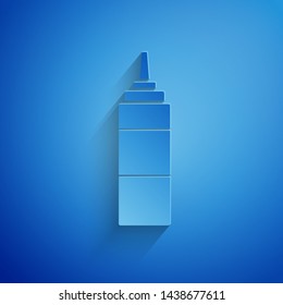 Paper cut Sauce bottle icon isolated on blue background. Ketchup, mustard and mayonnaise bottles with sauce for fast food. Paper art style. Vector Illustration