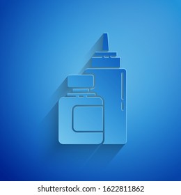 Paper cut Sauce bottle icon isolated on blue background. Ketchup, mustard and mayonnaise bottles with sauce for fast food. Paper art style. Vector Illustration