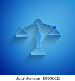 Paper cut Scales of justice icon isolated on blue background. Court of law symbol. Balance scale sign. Paper art style. Vector Illustration