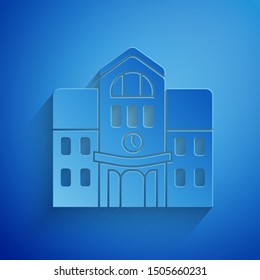 Paper cut School building icon isolated on blue background. Paper art style. Vector Illustration