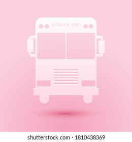 Paper cut School Bus icon isolated on pink background. Paper art style. Vector.