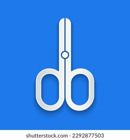 Paper cut Scissors icon isolated on blue background. Cutting tool sign. Paper art style. Vector