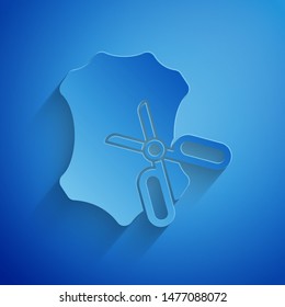 Paper cut Scissors and leather icon isolated on blue background. Tailor symbol. Cutting tool sign. Paper art style. Vector Illustration