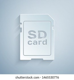 Paper cut SD card icon isolated on grey background. Memory card. Adapter icon. Paper art style. Vector Illustration