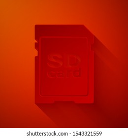 Paper cut SD card icon isolated on red background. Memory card. Adapter icon. Paper art style. Vector Illustration
