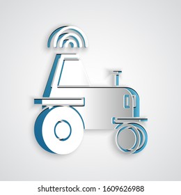 Paper cut Self driving wireless tractor on a smart farm icon isolated on grey background. Smart agriculture implement element. Paper art style. Vector Illustration