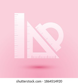Paper cut Set ruler, triangular ruler and protractor icon isolated on pink background. Straightedge sign. Triangle sign. Geometrical instruments. Paper art style. Vector.