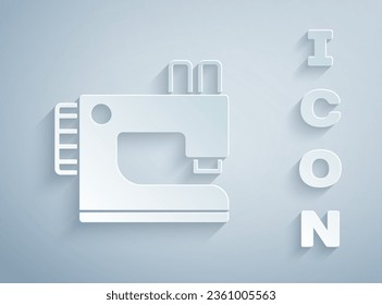 Paper cut Sewing machine icon isolated on grey background. Paper art style. Vector
