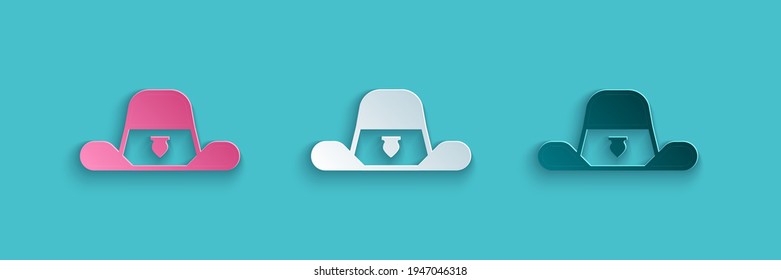 Paper cut Sheriff hat with badge icon isolated on blue background. Paper art style. Vector