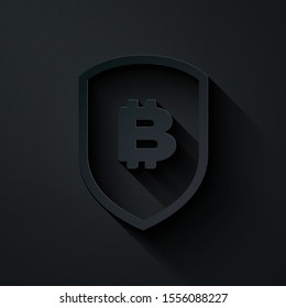 Paper cut Shield with bitcoin icon isolated on black background. Cryptocurrency mining, blockchain technology, security, protect, digital money. Paper art style. Vector Illustration