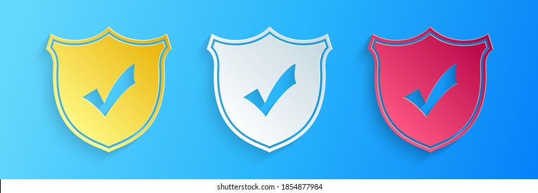Paper cut Shield with check mark icon isolated on blue background. Protection symbol. Security check Icon. Tick mark approved icon. Paper art style. Vector.