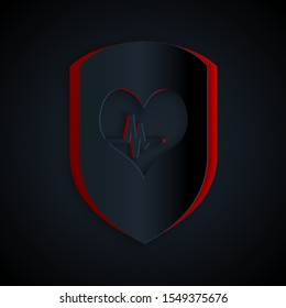 Paper cut Shield and heart rate icon isolated on black background. Health protection concept. Health care. Paper art style. Vector Illustration