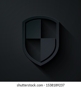Paper cut Shield icon isolated on black background. Guard sign. Paper art style. Vector Illustration