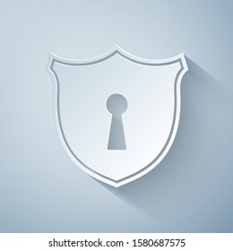 Paper cut Shield with keyhole icon isolated on grey background. Protection and security concept. Safety badge icon. Privacy banner. Defense tag. Paper art style. Vector Illustration