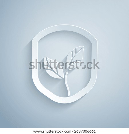 Paper cut Shield with leaf icon isolated on grey background. Eco-friendly security shield with leaf. Paper art style. Vector