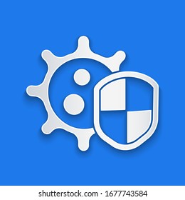 Paper cut Shield protecting from virus, germs and bacteria icon isolated on blue background. Immune system concept. Corona virus 2019-nCoV. Paper art style. Vector Illustration