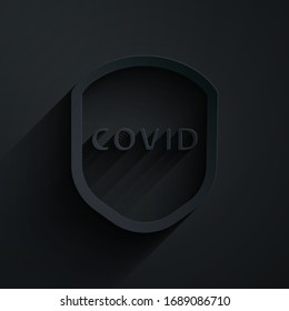 Escudo de corte de papel protegido contra virus, gérmenes y bacterias icono aislado en fondo negro. Concepto de sistema inmunológico. Virus corona covid-19. Estilo de arte de papel. Ilustración vectorial