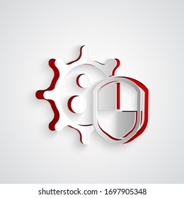 Paper cut Shield protecting from virus, germs and bacteria icon isolated on grey background. Immune system concept. Corona virus 2019-nCoV. Paper art style. Vector Illustration