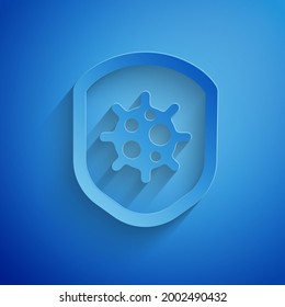 Paper cut Shield protecting from virus, germs and bacteria icon isolated on blue background. Immune system concept. Corona virus 2019-nCoV. Paper art style. Vector