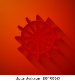 Paper cut Ship steering wheel icon isolated on red background. Paper art style. Vector Illustration