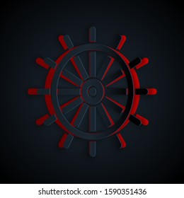 Paper cut Ship steering wheel icon isolated on black background. Paper art style. Vector Illustration