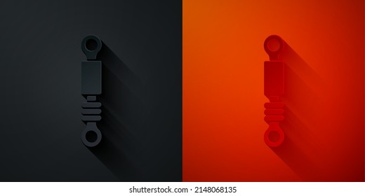 Paper cut Shock absorber icon isolated on black and red background. Paper art style. Vector