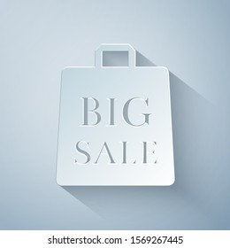 Paper cut Shoping bag with an inscription Big Sale icon isolated on grey background. Handbag sign. Woman bag icon. Female handbag sign. Paper art style. Vector Illustration