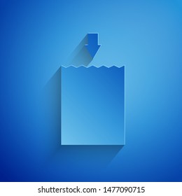 Paper cut Paper shopping bag icon isolated on blue background. Package sign. Paper art style. Vector Illustration