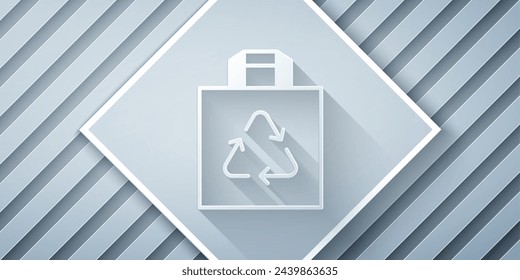 Paper cut Paper shopping bag with recycle icon isolated on grey background. Bag with recycling symbol. Paper art style. Vector