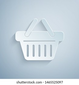Paper cut Shopping basket icon isolated on grey background. Paper art style. Vector Illustration