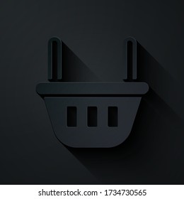 Paper cut Shopping basket icon isolated on black background. Food store, supermarket. Paper art style. Vector Illustration