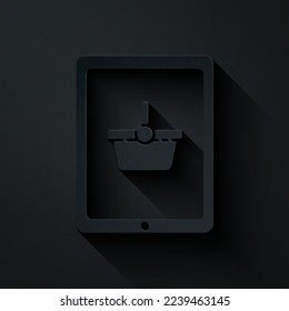 Paper cut Shopping basket on screen tablet icon isolated on black background. Concept e-commerce, e-business, online business marketing. Paper art style. Vector Illustration