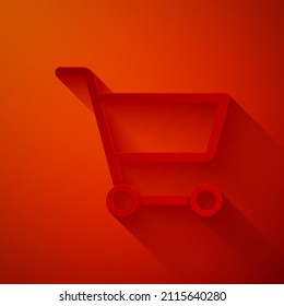 Paper cut Shopping cart icon isolated on red background. Online buying concept. Delivery service sign. Supermarket basket symbol. Paper art style. Vector Illustration