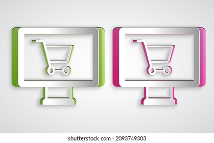 Recorte de papel Carro de compras en el icono del monitor aislado en el fondo gris. Concepto de comercio electrónico, comercio electrónico, marketing de negocios en línea. Estilo de arte de papel. Vector