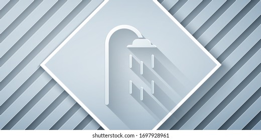 Paper cut Shower head with water drops flowing icon isolated on grey background. Paper art style. Vector Illustration